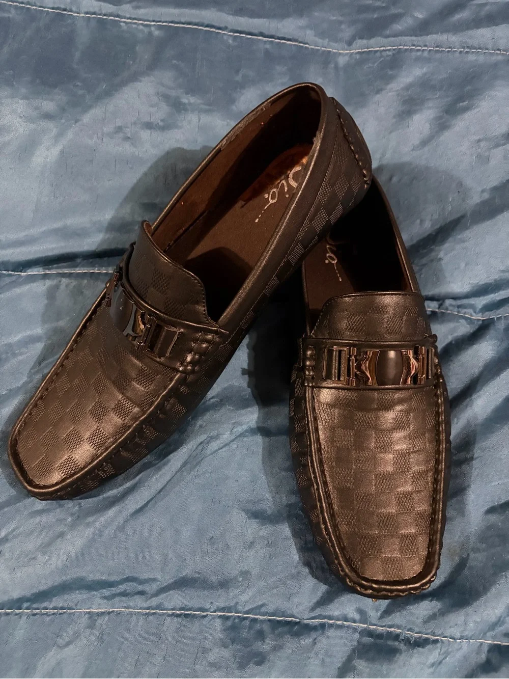 Men's black slip-on loafers with silver tone decorative bit